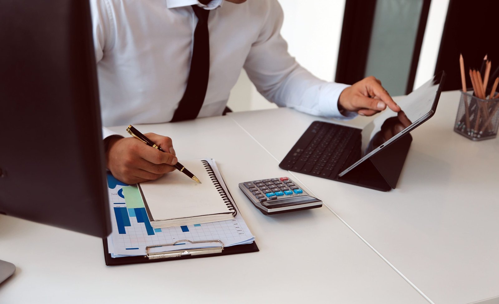 Services vecteezy-close-up-of-business-team-analyzing-income-charts-and-graphs-32209683